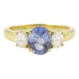 18ct gold three stone oval cut sapphire and oval cut diamond ring