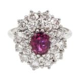 18ct white gold oval ruby and two row round brilliant cut diamond cluster ring