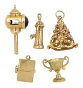 Five 9ct gold charms including lantern