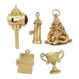 Five 9ct gold charms including lantern