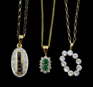 Three 9ct gold pendant necklaces including emerald and diamond