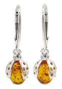 Pair of silver and Baltic amber ladybird pendant earrings