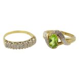 9ct gold oval peridot and diamond chip crossover ring and an 18ct gold illusion set diamond chip rin