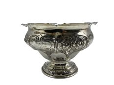 Edwardian silver rose bowl golf trophy 'Tyneside Golf Club' with embossed decoration and short pedes