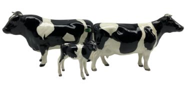 Beswick Friesian Cow Family comprising CH. Coddington Hilt Bar bull