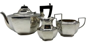 Silver three piece Art Deco tea set of panel sided design