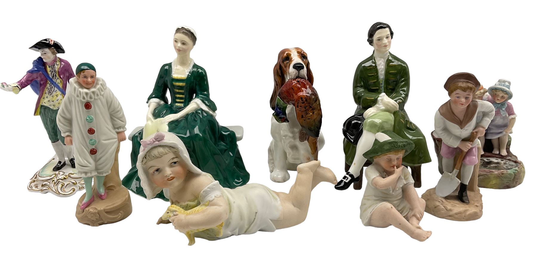 Royal Doulton figure of a spaniel with a pheasant HN1028