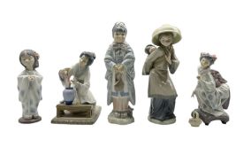 Five Lladro figures comprising 'Flower Arranger' no. 4840