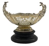 Edwardian silver fruit basket of oval design with raised pierced leaf ends