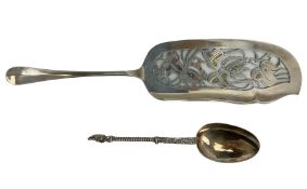 Dutch silver fish slice with floral pierced blade and a Hanau silver apostle spoon (2)