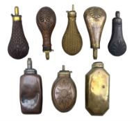 Eight copper and brass powder flasks including two by Sykes Patent