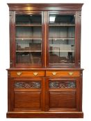 Late 19th century walnut bookcase on cupboard