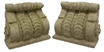 Pair of scrolled cast corbels