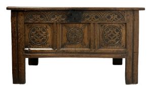 Early 19th century carved oak blanket box