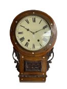 Late 19th century American drop dial clock in a mahogany case with mother of pearl inlay