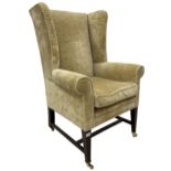 19th century wingback armchair upholstered in ivory fabric