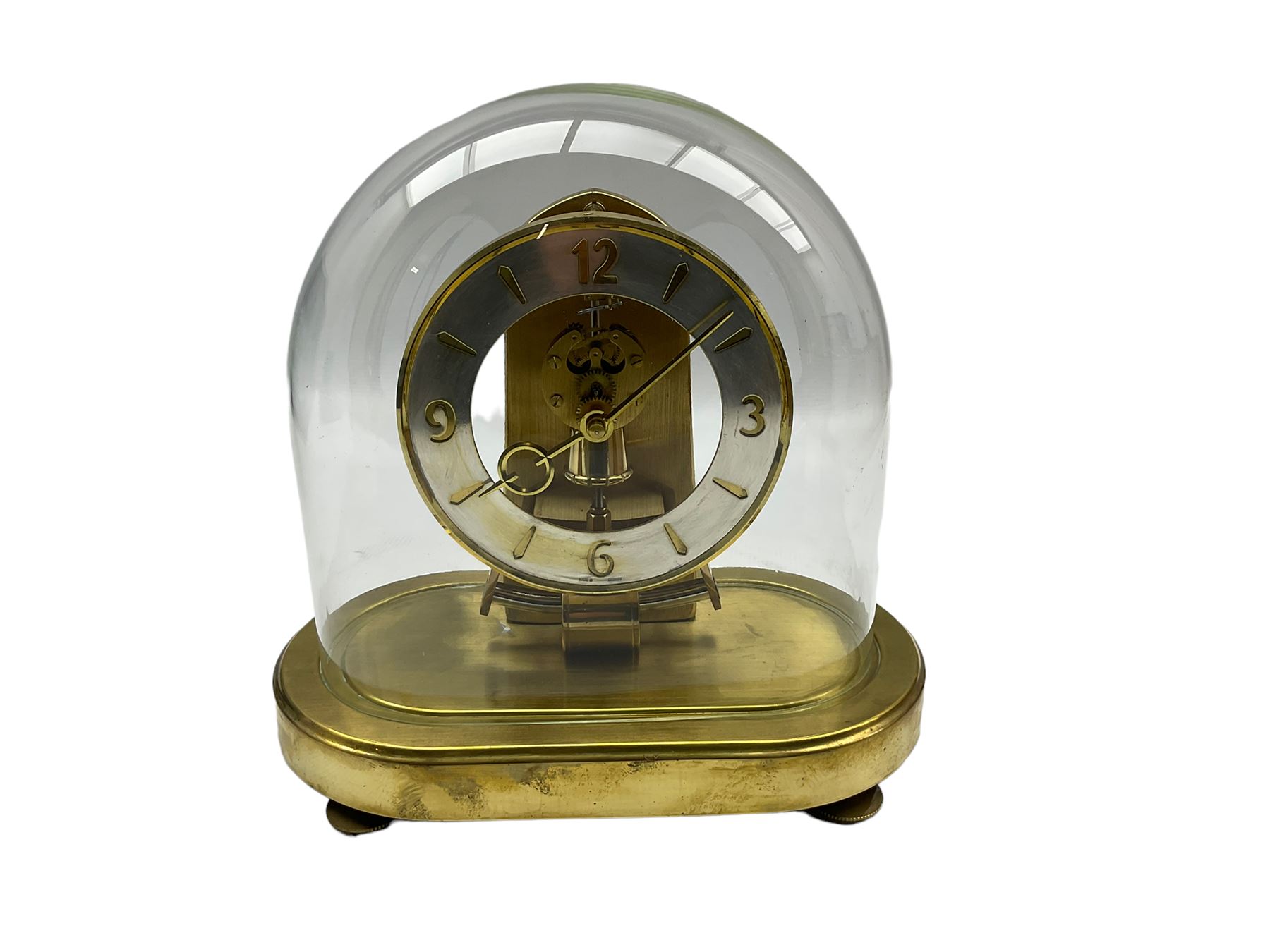 German 1970's �Schatz� battery operated mantle clock with an oscillating pendulum under an oval glas