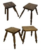 Four small oak stools of various sizes