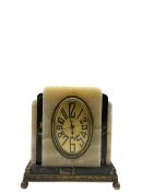 A compact 20th century Fisco French Art Deco cream onyx and gold veined black marble alarm clock rai