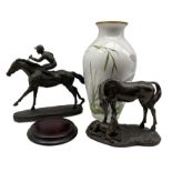 Heredities bronzed horse and jockey group