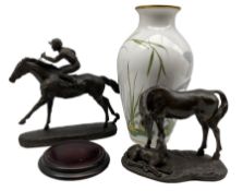 Heredities bronzed horse and jockey group