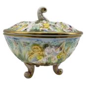 Capodimonte bowl and cover on feet with curved finial decorated with cherubs and gilt H14cm