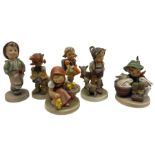 Collection of Hummel figures including Boy With Rabbits