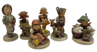 Collection of Hummel figures including Boy With Rabbits