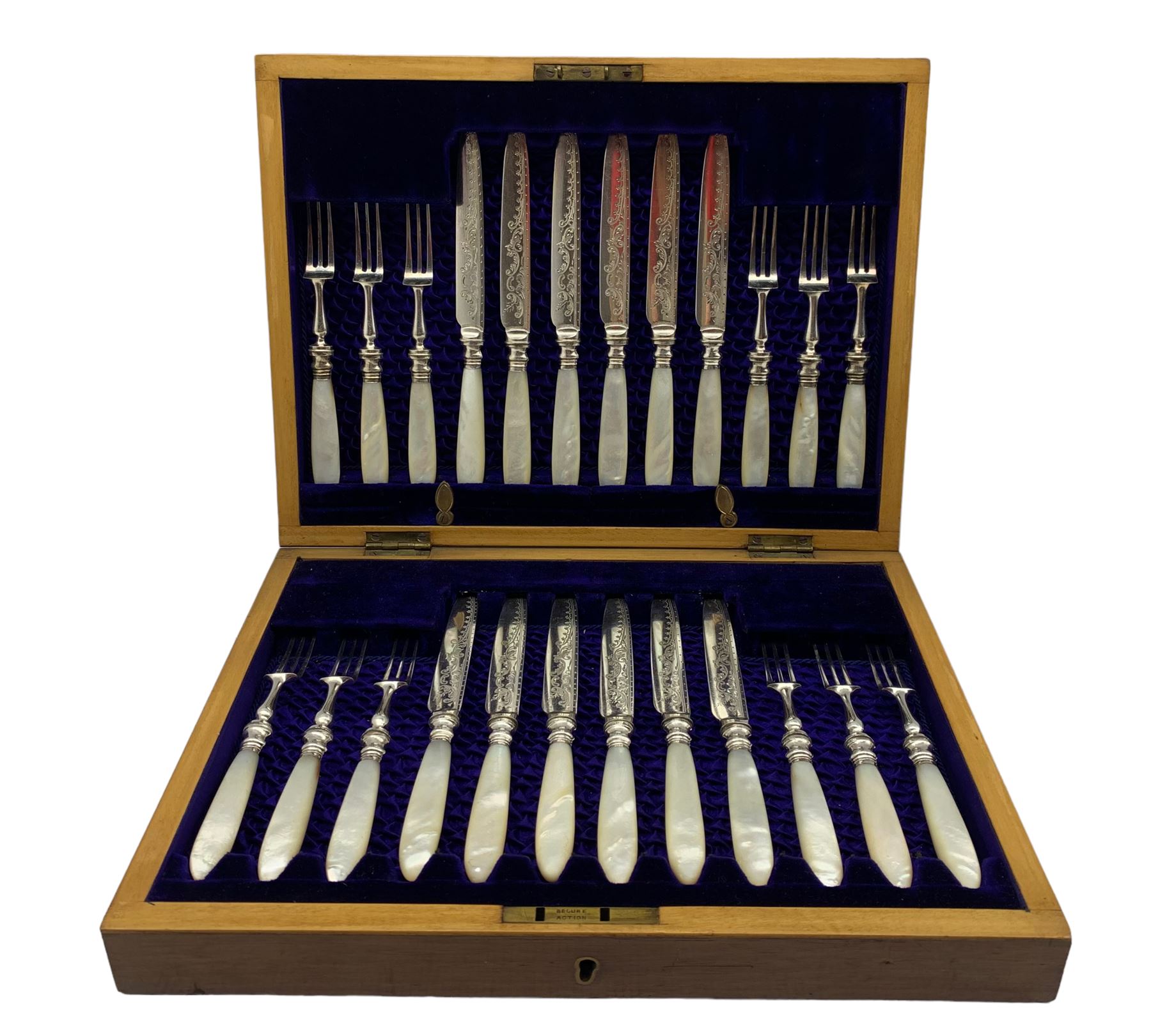 Mother of pearl handled silver plate fruit knives and forks in oak case with blue velvet lining W32c
