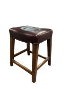 20th century stool with seat upholstered in red leather