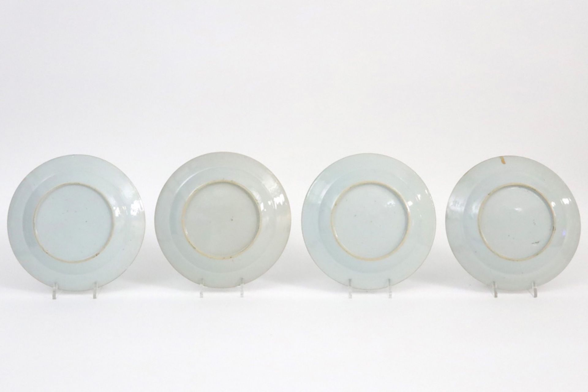 set of four 18th Cent. Chinese plates in porcelain with blue-white garden decor || Set van vier - Image 2 of 2