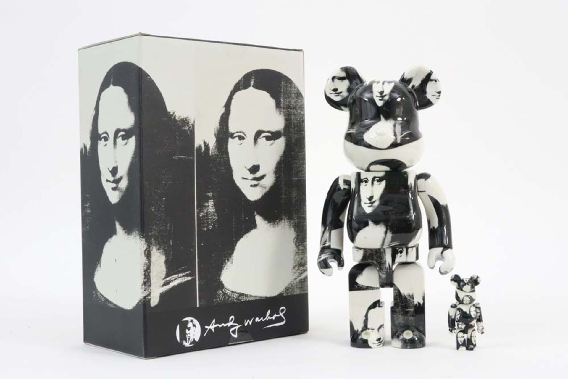 Bearbrick set of small and bigger sculpture after the double Mona Lisa" print by Andy Warhol -