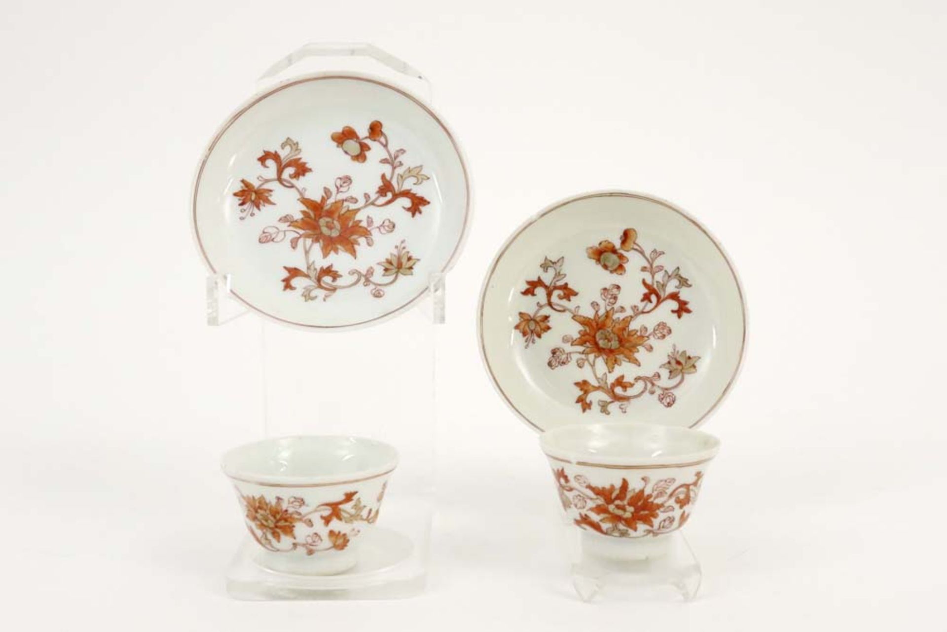 two 18th Cent. Chinese sets of cup and saucer in porcelain with a flower decor in sanguine colors - Image 6 of 7