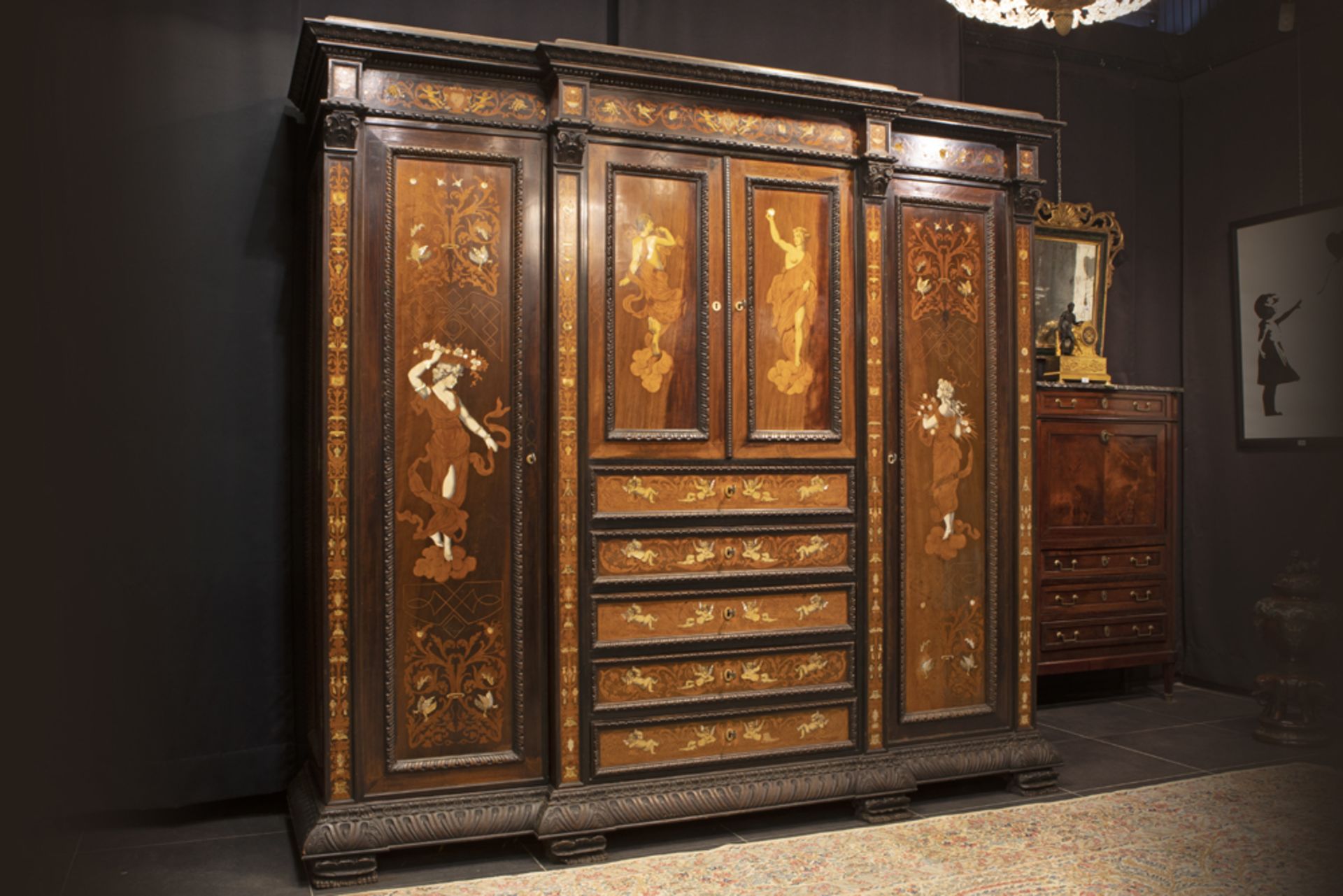 quite exceptional, antique Italian armoire (presumably from Tuscany) in walnut and rose-wood adorned