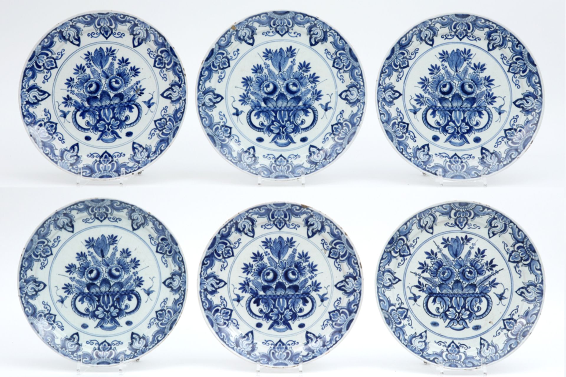 set of six 18th Cent. plates in ceramic from Delft with blue-white decor || Reeks van zes achttiende