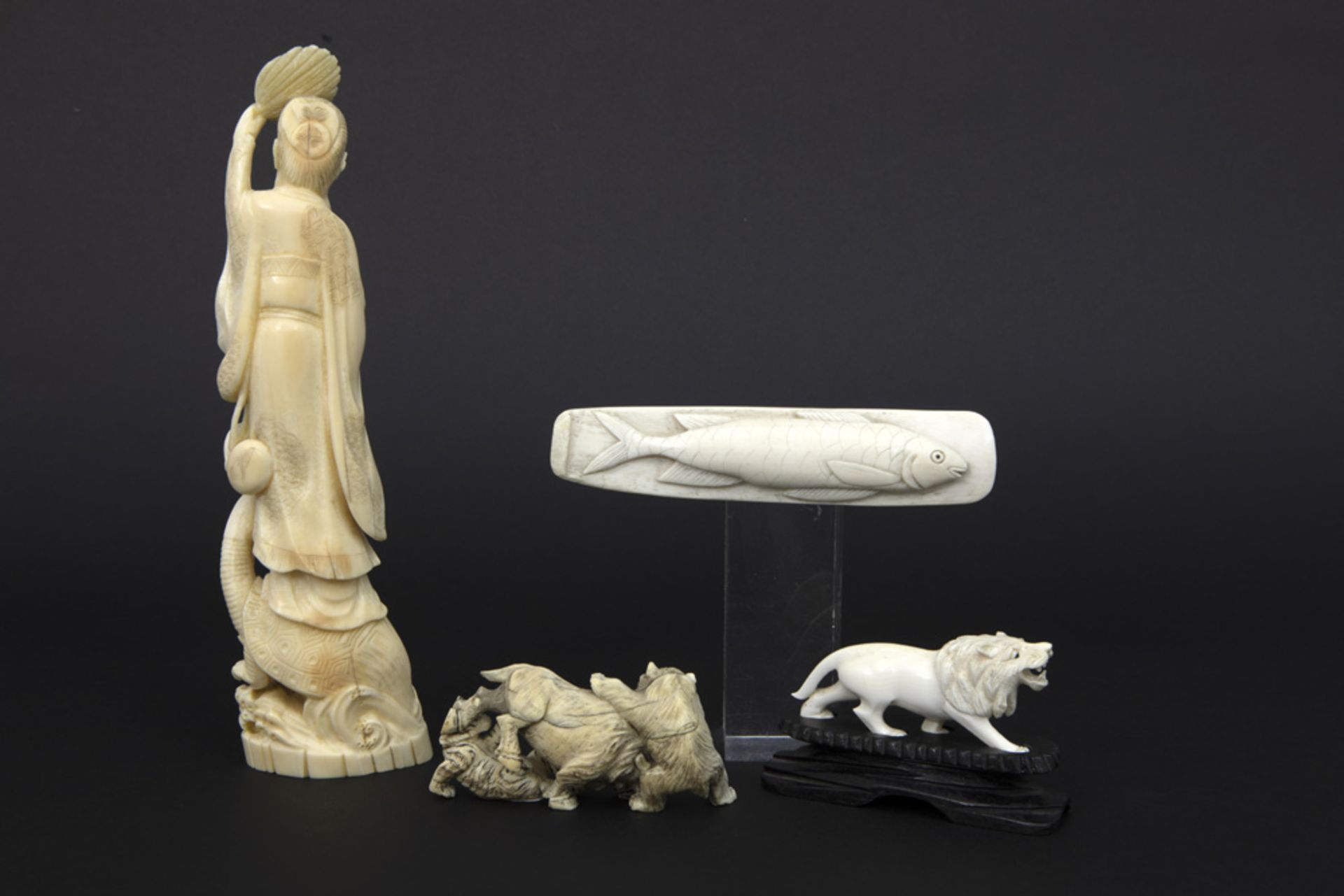 four ivory items amongst which a paperweight (with fish) and "Sage standing on tortoise" - Image 2 of 2