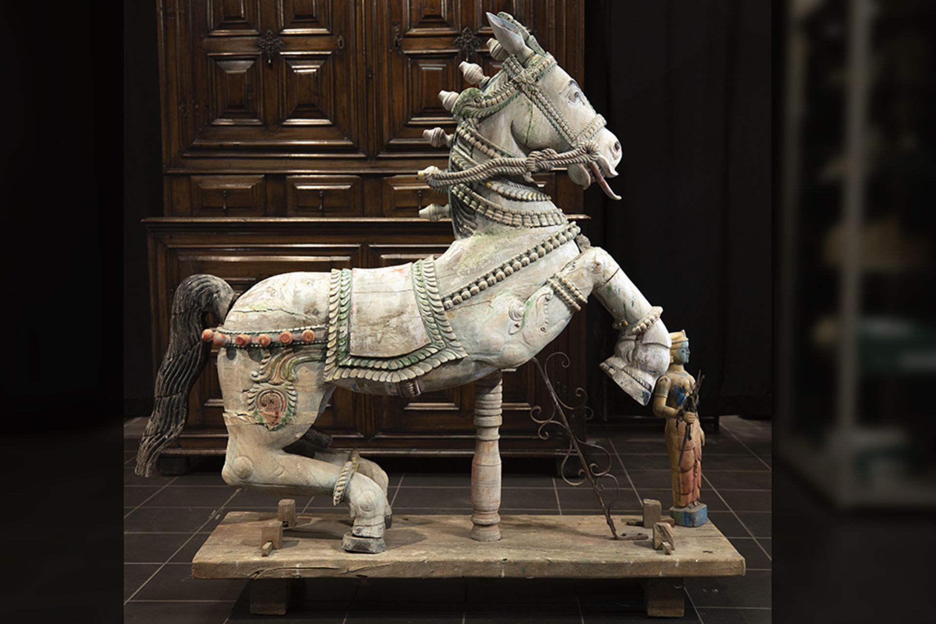 antique Indian "Horse" sculpture, part of a ceremonial Hindu carriage, in wood with remains of the