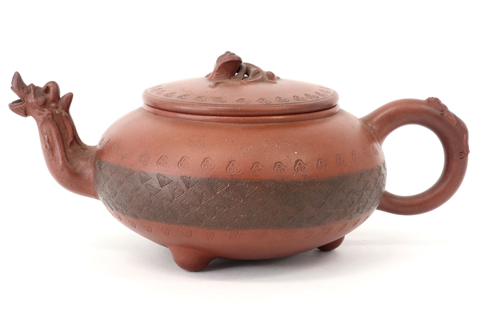 Chinese Yixing tea pot in marked earthenware with a dragon shaped spout and finely detailed