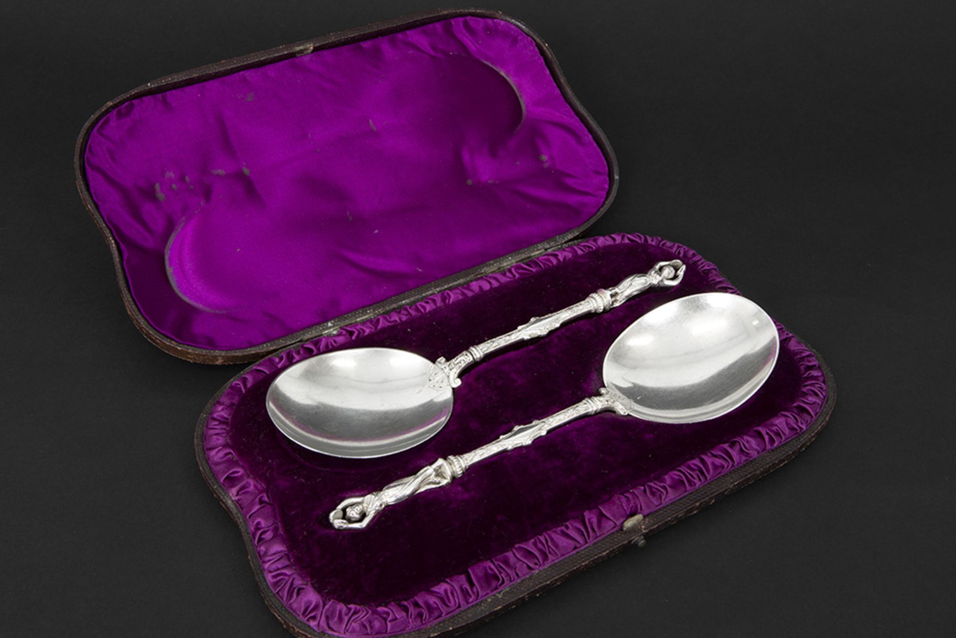 antique set of two serving spoons in Edward Hutton signed and marked silver in their original