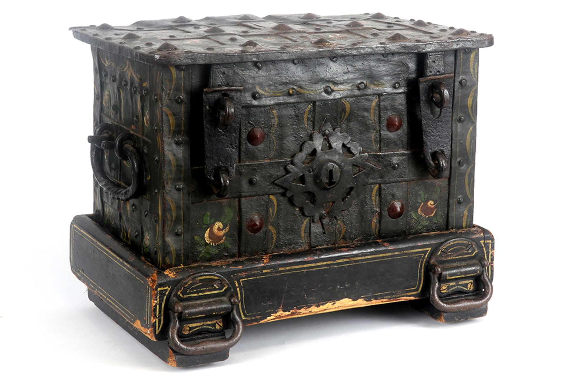 17th Cent. because of the small size quite rare chest in iron with remains of the original