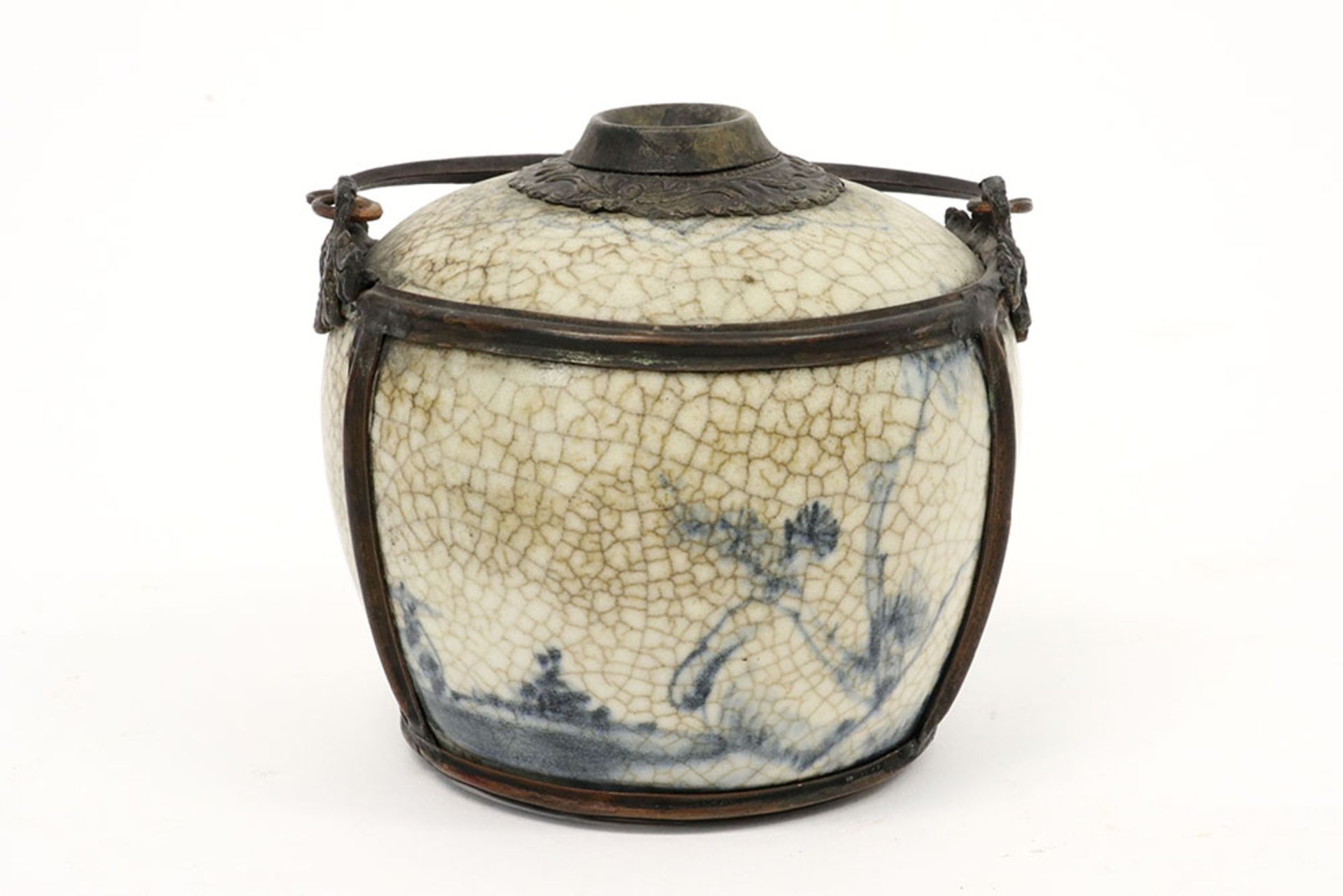 Chinese inkwell in marked crackle glazed porcelain with blue-white decor and metal mounting ||