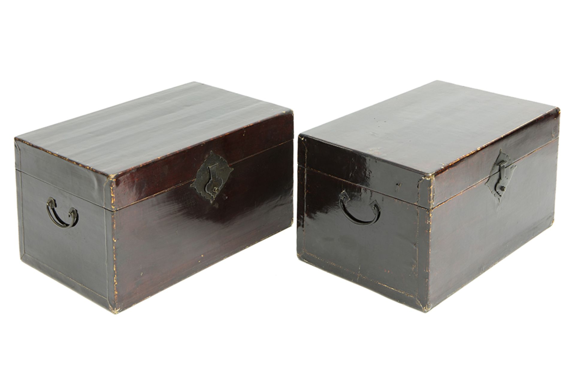 pair of small 19th Cent. Chinese Qing dynasty chests in lacquered wood with a typical lock ||