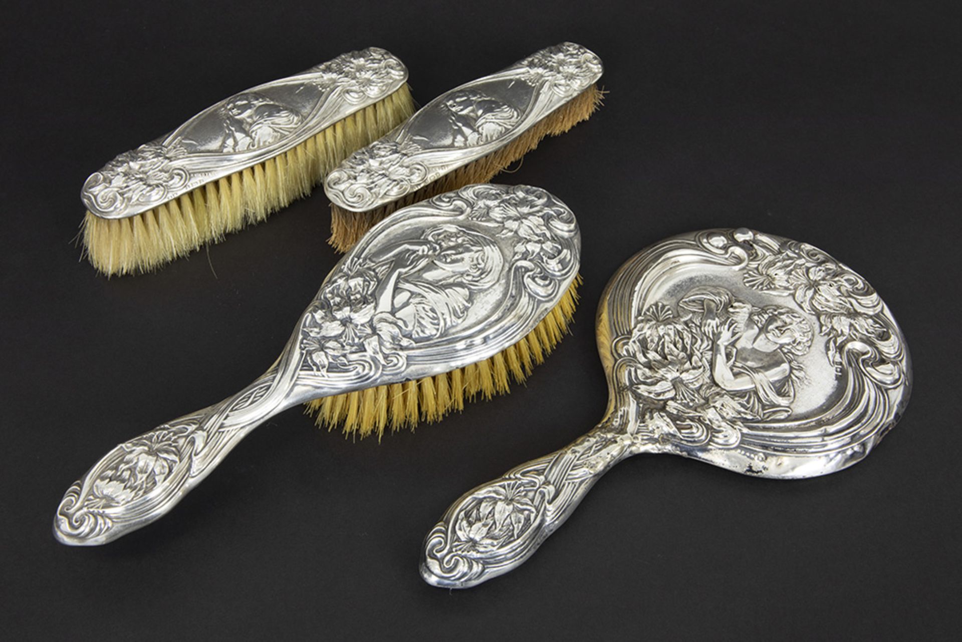 English 4pc Art Nouveau toiletset in "Henry Matthews" signed and marked silver with typical whiplash