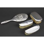 English 4pc Art Nouveau toiletset in "Henry Matthews" signed and marked silver with typical whiplash