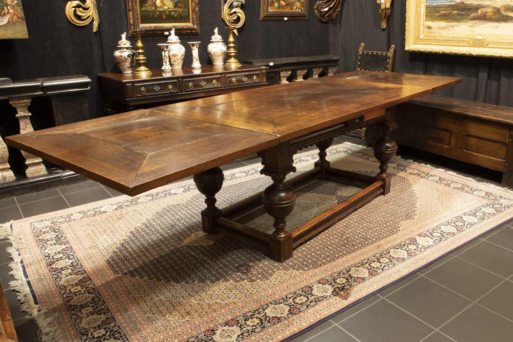 set of a Renaissance revival table in oak and ebony and a set of 10 oak chairs in Flemish - Image 2 of 3