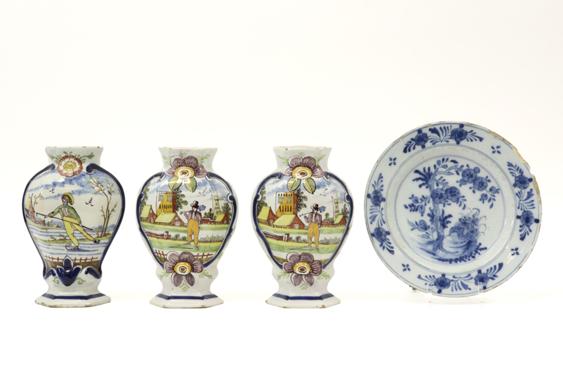 three 18th Cent. vases in marked ceramic from Delft and small plate with a blue-white decor ||
