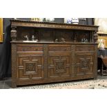 antique English renaissance revival Court Cupboard in oak with typical inlay and sculpted