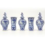 18th Cent. 5pc garniture in marked ceramic from Delft with a blue-white decor || Achttiende eeuws