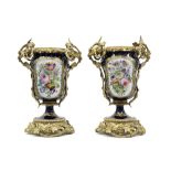 pair of 19th Cent. vases in Sèvres porcelain with Louis XV style mountings in gilded bronze ||