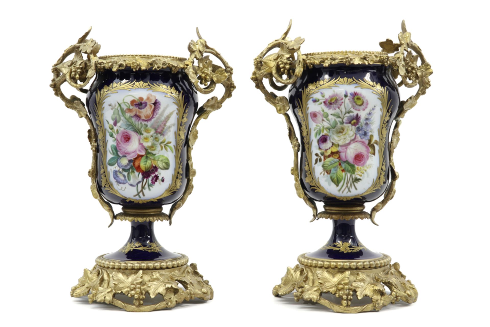 pair of 19th Cent. vases in Sèvres porcelain with Louis XV style mountings in gilded bronze ||